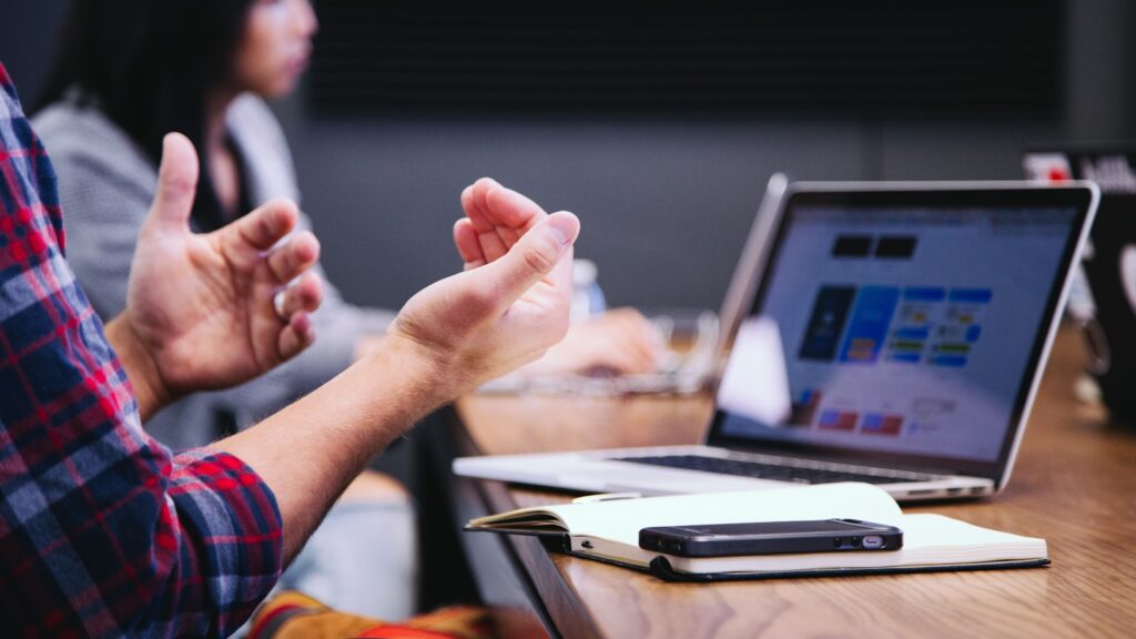 HR consultant meeting with a client at a table in Adelaide